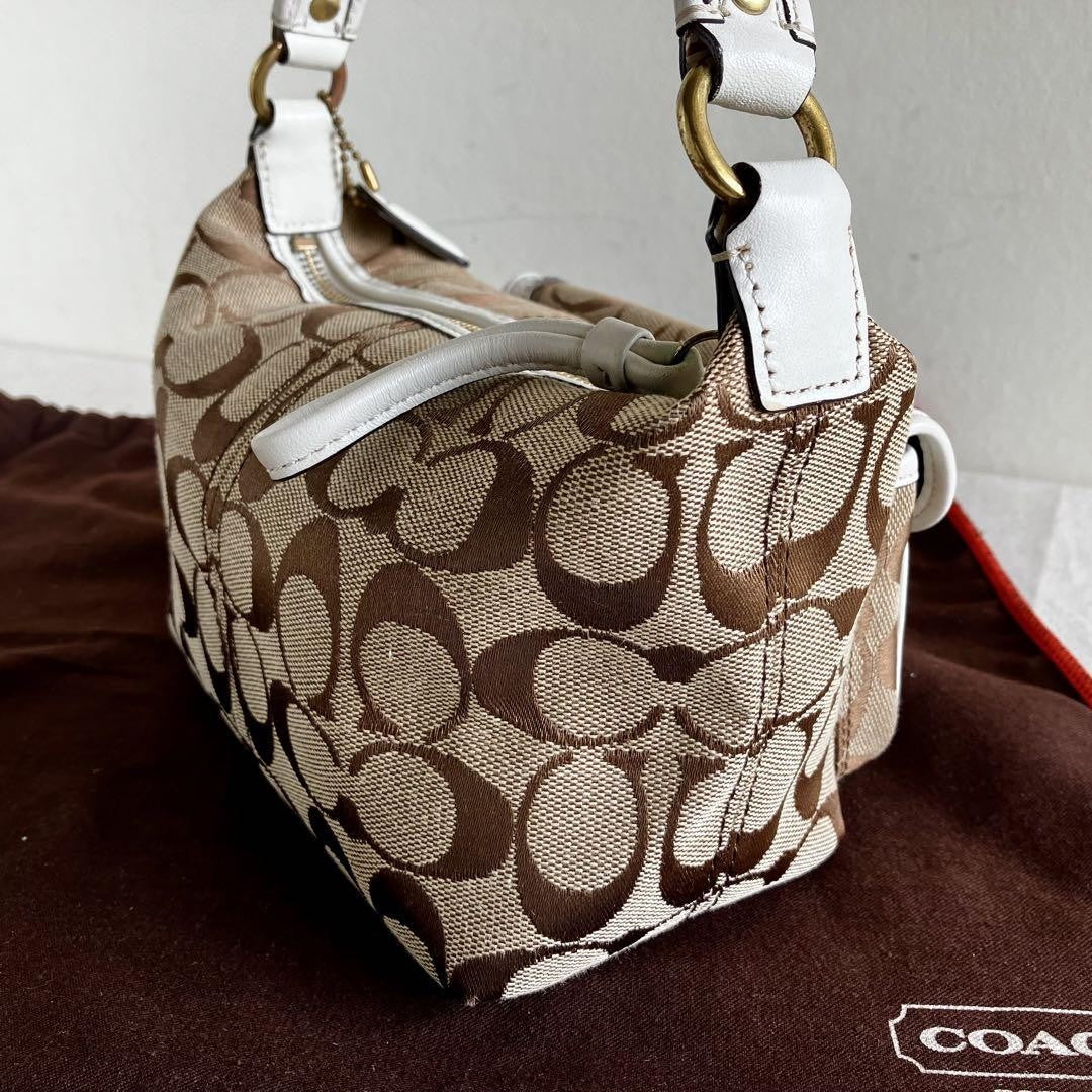 COACH Signature Legacy Flap Handbag – Brown & White Canvas Leather