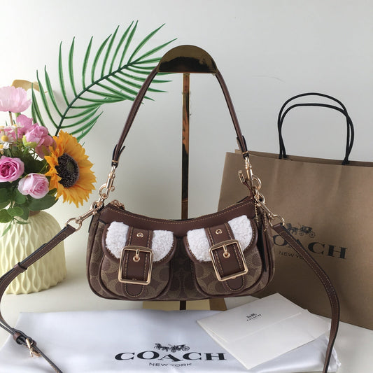 COACH Ashton Baguette Bag - Signature Canvas with Shearling